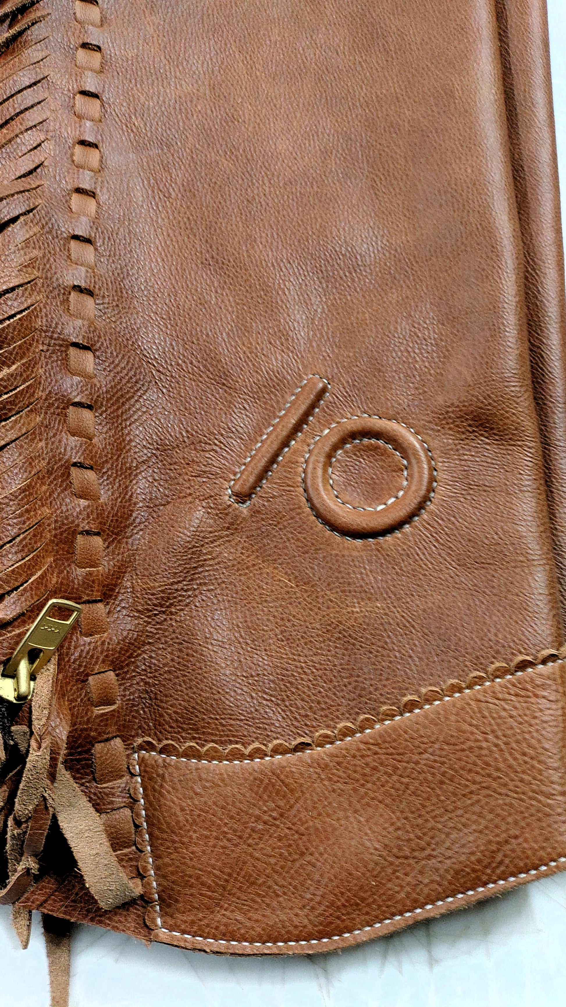 custom raised brand on shotgun chaps